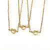 Collar de acero de titanio con nudo de amor, estilo japonés y coreano, con temperamento femenino, cadena de clavícula chapada en oro que combina con todo, al por mayor