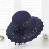 Sombrero de pescador tejido calado floral estilo coreano para niñas, adecuado para salidas de primavera y verano, sombrero tipo cubo que hace que la cara se vea más pequeña, versátil y adecuado para un look natural
