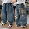 Calças Jeans Masculinas para Primavera e Outono com Barra Curva Estilo Coreano Infantis Bonitas Largas Versáteis para Crianças Pequenas e Médias Calças Longas Comércio Exterior