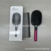 Un cepillo de pelo popular con cerdas grandes para mujeres y hombres con dientes anchos, adecuado para cabello largo, con cojín de aire y función de masaje, para uso doméstico