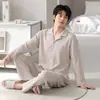 Nuevos pijamas de algodón puro para otoño e invierno para hombre, estilo casual simple, cárdigan de manga larga, conjunto de ropa de casa para jóvenes, se puede usar afuera