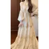 Estilo vacacional francés vestido de hada atmósfera de pintura al óleo temperamento vestido plisado floral cintura ceñida manga abullonada descanso del té falda larga