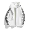 Chaqueta deportiva de tres rayas para primavera y otoño para hombres y mujeres, abrigo ligero casual con capucha, corte holgado, talla grande, ropa deportiva para correr