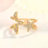 Novo anel duplo de estrela com incrustação de diamante de cinco pontas banhado a 925 moda personalidade aberto oco estrela de cinco pontas popular anel de chuva
