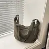 Bolso bandolera popular de tela Oxford para mujer de este año, nuevo bolso casual tipo 'dumpling' de un solo hombro para estudiante, clase, commute 2026