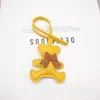 Nuevo Colgante de Oso con Lazo de Cuero de PU, Encanto de Bolsa de Dibujos Animados Multicolor, Accesorio para Llavero, Decoración de Regalo