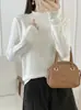 Suéter de punto de cuello medio alto estilo coreano para mujer, nuevo suéter suave de ajuste ceñido para otoño e invierno 2026, elegante top básico