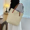 Bolso de mano nuevo para mujer con textura tejida, bolsa de paja de gran capacidad, casual y versátil para el trabajo, bolso de mano simple y ligero