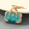 Llavero Colgante para Bolso de Mujer con Diseño Creativo de Goteo de Aceite de Lujo Ligero Europeo y Americano, Llavero Accesorio para Bolso de Mujer Incrustado con Diamantes Exquisitos Venta al por Mayor