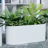 Tienda de té con leche maceta blanca de doble semicírculo maceta comercial calle comercial combinación de jardinera de hierro para exteriores canaleta floral ovalada