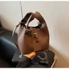 Bolso de Mano Texturizado Retro Transfronterizo para Mujer 2024 Otoño e Invierno Nueva Moda Simple Bolso Balde Combinable Bolso Bandolera