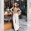 Suéter de punto vintage estilo Hong Kong, de un solo pecho, cuello en V, con pequeñas mangas acampanadas para mujer, diseño de verano con cintura entallada y top versátil