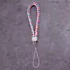 Lanyard para teléfono móvil al por mayor de fábrica, cordón para llavero de cámara de cuero PU, cuerda de muñeca para teléfono móvil de pareja, cuerda tejida de cuero