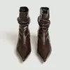 Venta al por mayor transfronteriza europea y americana: Botines de otoño/invierno 2026, adelgazantes y con forro cálido, de tacón fino, estilo Chelsea cortos para mujer