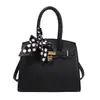 Bolsa de mão minimalista de nicho para mulheres, nova coleção outono 2026, moderna, simples, de alta qualidade, elegante bolsa de ombro e bolsa transversal