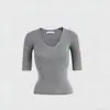 Suéter de punto de moda estilo francés con cuello en V y manga de tres cuartos para mujer, nueva camiseta base ajustada de verano 2026