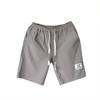 Pantalones cortos de verano para hombre nuevos estilo japonés pantalones cortos casuales holgados de moda para hombre con etiquetado deportivo pantalones de playa