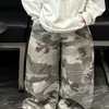 Nueva colección primavera y otoño 2026: conjunto elegante y casual para niños, con un chaleco de corte holgado, una sudadera básica y pantalones de trabajo de camuflaje