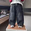 Calças Jeans Infantis de Primavera e Outono com Barra Curva Estilo Coreano Calças Casuais Frescas e Estilosas para Crianças Calças para Bebês Atacado de Comércio Exterior