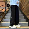 Pantalones de Calle Americanos para Hombre Primavera Otoño 2026 Nueva Marca de Tendencia Versátiles Sueltos Pierna Recta Sentido del Diseño Estrellas Pantalones Casuales