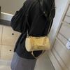 Bolsa de Palha Tecida Colorida da Moda com Design de Nicho 2025 Nova Casual Versátil Elegante Bolsa de Mão com Corrente Bolsa de Ombro para Mulheres