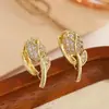 Novo Ear Cuff de Tulipa de Alto Padrão com Zircônia Incrustada em Cobre para Mulheres Design de Nicho Estiloso Elegante Brincos Ladylike