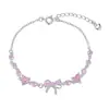 Nuevo Pulsera de Corazón de Amor con Lazo Estilo Coreano para Mujer Lujo Ligero Diseño de Nicho Sensación de Alta Gama Zircón Rosa en Forma de Corazón Joyería de Mano Regalo para Novia