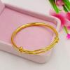 Pulsera redonda lisa de latón dorado con baño de oro, joyería de oro de imitación, fabricantes directos, pulsera soldada para damas al por mayor