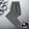 [Fábrica en stock] Pantalones de seda de hielo para hombre, talla grande, rectos, casuales, de verano, finos, de nailon.
