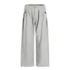 Pantalones holgados de pierna ancha de color liso para hombre, marca de moda con vibra high street, diseño plisado, forro polar, pantalones casuales versátiles