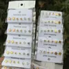Pendientes de acero inoxidable resistentes al color, con forma de cuatro garras, estilo europeo y americano, con rosca para el oído, sin necesidad de púas y circonitas.