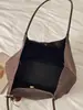 Bolso tote nuevo de alta calidad y gran capacidad para mujer 2026, adecuado para el trabajo y los desplazamientos, con un patrón tejido, diseño retro de moda y color sólido