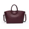 Bolso de mano de moda con patrón de lichi de lujo ligero transfronterizo, bolso de hombro vintage de alta gama para el trabajo, bolso tote estiloso de diseño nicho