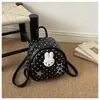 Mochila fofa de coelho com bolinhas estilo coreano para mulheres, mochila escolar de desenho animado de design nichado para estudantes, mochila versátil de grande capacidade