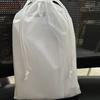 Fábrica en stock bolsa de malla densa con cordón bolsa bolsa de almacenamiento