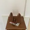 Bolso retro de axila estilo coreano, nuevo modelo de verano 2026, bolso de hombro de alto valor estético, bandolera casual, simple, de nicho para el día a día