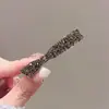 Pinza para el pelo de pico de pato de alta gama, estilo lujo ligero, nuevo 2026, con delicados diamantes de imitación, accesorio para el pelo de pinza lateral lindo y sin costuras para mujeres con alto atractivo estético