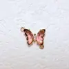 Colgante de Mariposa con Incrustaciones de Zirconia Dorada Recubierta de Cobre 18k Accesorios para Joyería DIY Pulsera Collar Material Hecho a Mano Doble Colgante Oblicuo Tamaño Pequeño