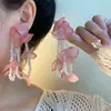 Pendientes de Tela con Borlas de Flor Exagerada Adecuados para Pendientes de Primavera 2025 Nuevos Pendientes Populares de Diseño de Nicho