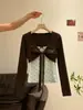 Conjunto dulce de dos piezas estilo coreano para mujer, camiseta corta de lunares con pajarita, top de manga larga ajustado, otoño 2026