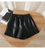Pantalones Cortos de Cuero PU para Mujer 2026 Otoño/Invierno Nuevo Estilo Talla Grande Sueltos Pierna Ancha Adelgazantes Cintura Alta Moda Ropa Exterior Capa Base Pantalones de Boca de Campana