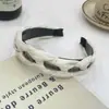 Diadema retorcida de puntos de onda negros para mujer, sentido de alta gama, para salir, pasador Joker, tocado, diadema de presión para lavar la cara, maquillaje, venta al por mayor