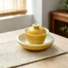 Nuevo soporte de cerámica para tetera de osmanthus pintado a mano, una bandeja de té pequeña y fresca de color amarillo anaranjado para uso doméstico, una mesita de té pequeña y accesorios para ceremony de té para servir té y bocadillos