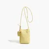 Bolso tejido de moda minimalista de nicho Nuevo bolso pequeño ligero para teléfono móvil para mujer Bolso cruzado mini vertical para caminar