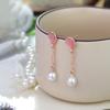 Moda europea y americana transfronteriza diseño versátil cristal pedrería colgante de amor temperamento aretes de mujer aretes ins amor