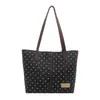 Bolso de hombro tipo cubo de moda transfronteriza de lunares para axila de mujer 2026 nuevo de verano gran capacidad nicho popular de un solo hombro