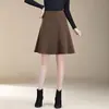 Falda de lana de color liso con dobladillo ancho, nuevo estilo de otoño 2026 para mujer, falda de línea A a la moda que estiliza la figura y te hace lucir más joven