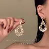 Brincos de Zircônia Vazados em Forma de Gota d'Água para Mulheres Estilo Novo Luxo Leve Sensação de Alto Padrão Design de Nicho Tarraxas Retrô Acessórios de Brincos Exagerados Personalizados