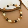 Collar de doble capa con cuentas acrílicas transfronterizo europeo y americano, cadena para la clavícula de lujo ligero de alta gama, joyería de estilo étnico vintage al por mayor