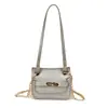 Bolso Pequeño Cuadrado de Cadena Moda Versátil Color Sólido Textura de Gama Alta Tendencia Simple Otoño Nuevo Bolso Cruzado de Nicho para Niños